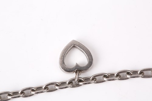 Lot 39 - Tiffany & Co. - a diamond-set heart charm...