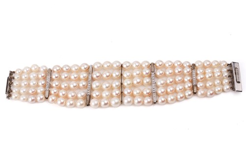 Lot 262 - A five-row graduated pearl bracelet with...