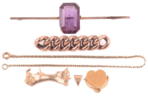 Lot 263 - An amethyst bar brooch stamped 9ct to the...