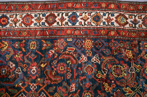 Lot 153 - A long antique Bidjar runner with Herat motif...