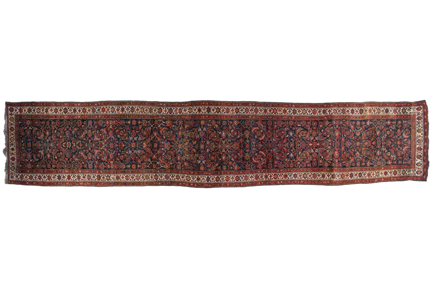 Lot 153 - A long antique Bidjar runner with Herat motif...