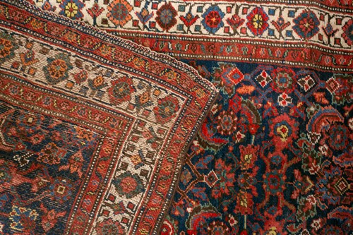 Lot 153 - A long antique Bidjar runner with Herat motif...