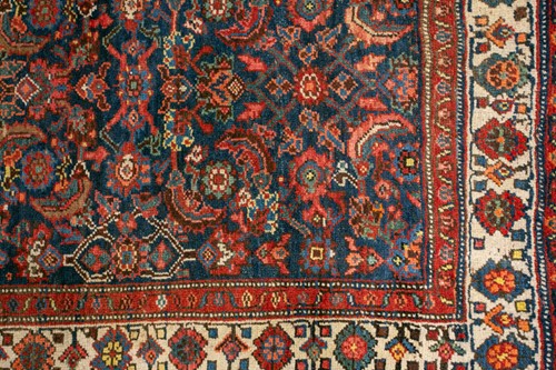 Lot 153 - A long antique Bidjar runner with Herat motif...