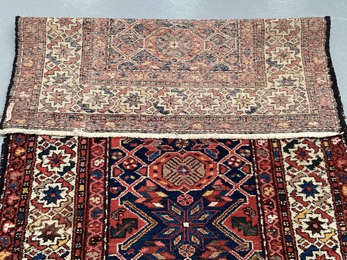 Lot 152 - • An antique Hammadan/Malayer runner with a...