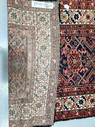 Lot 152 - • An antique Hammadan/Malayer runner with a...