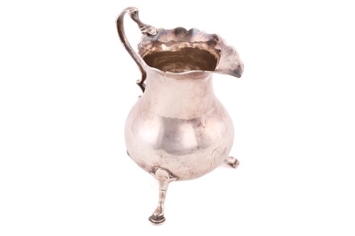 Lot 520 - A George III small silver cream jug, by Samuel...