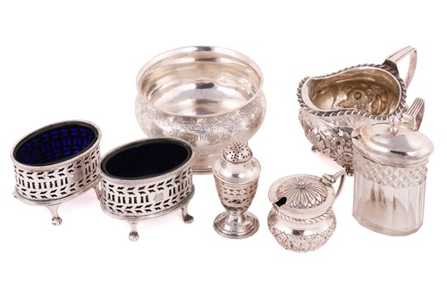 Lot 513 - A George IV milk jug, hallmarked London 1825,...