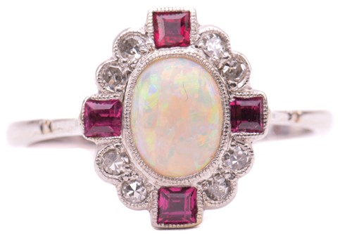 Lot 221 - An Art Deco opal, ruby and diamond dress ring,...