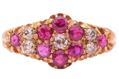 Lot 175 - An Edwardian ruby and diamond cluster ring,...