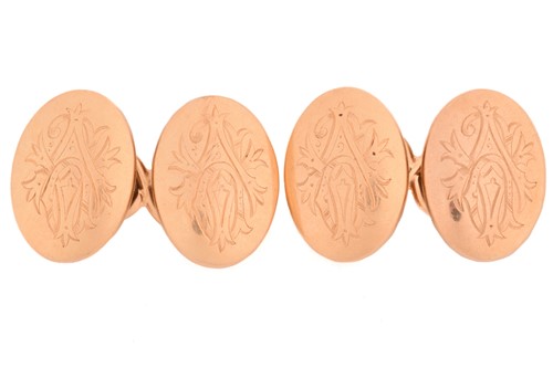 Lot 216 - A pair of oval cufflinks with monogram VPA,...