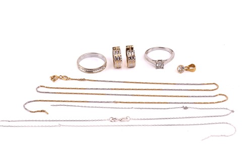 Lot 115 - A diamond engagement ring, a wedding band and...