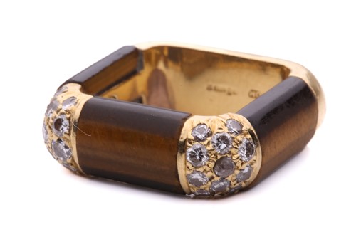Lot 278 - A tiger's eye and diamond dress ring in 18ct...