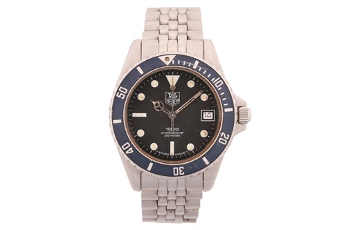 Lot 446 - A Tag Heuer Professional 1000 series quartz...