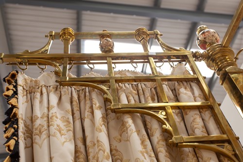 Lot 134 - A Victorian heavy square section gilt brass...