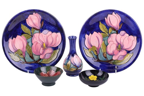 Lot 106 - A pair of Walter Moorcroft circular pottery...