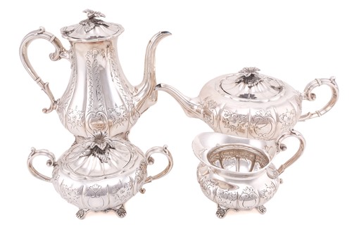 Lot 512 - A four piece tea and coffee set; lobed, low...
