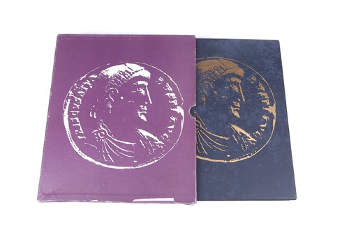 Lot 165 - An album containing a collection of coins,...