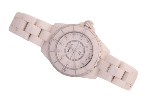 Lot 389 - A Chanel J12 white ceramic quartz wristwatch...