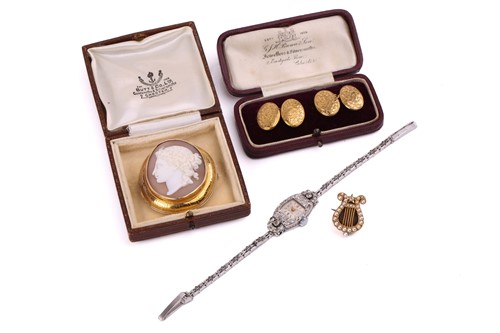 Lot 253 - A platinum and diamond cocktail watch, the...