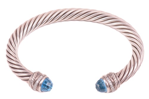 Lot 35 - A gem-set torque bangle by David Yurman,...