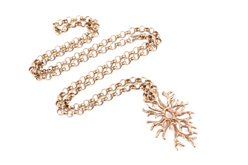 Lot 8 - A gold pendant of abstract organic form,...