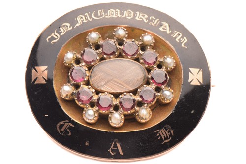 Lot 16 - A Victorian garnet, seed pearl and enamel...