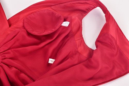 Lot 71 - Bruce Oldfield - a red velvet full-length...
