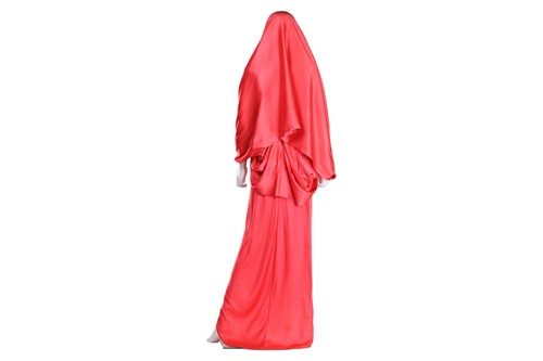 Lot 70 - A bright coral-coloured hooded full-length...