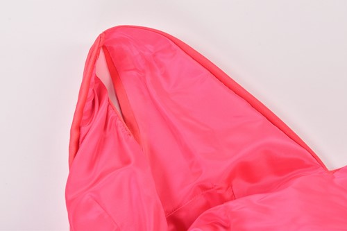 Lot 70 - A bright coral-coloured hooded full-length...