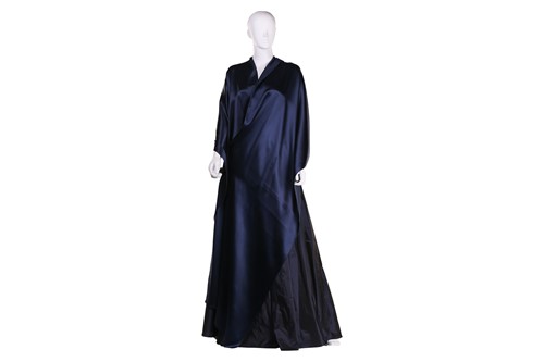 Lot 96 - Two circle skirts, a clutch and a shawl;...