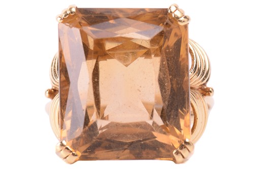 Lot 19 - A single stone citrine dress ring, the large...