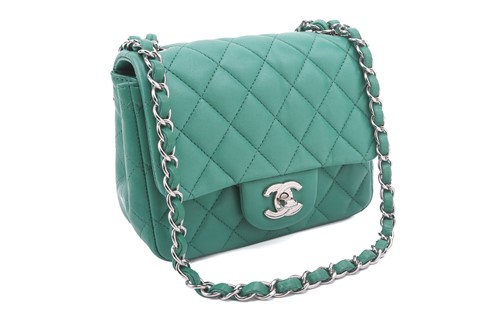 Lot 7 - Chanel - a mini flap bag in green...