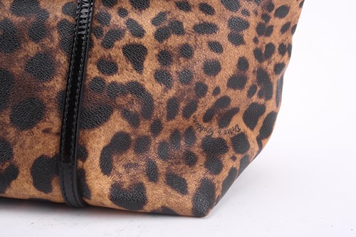 Lot 21 - Dolce & Gabbana - a large leopard print...