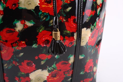 Lot 24 - Dolce & Gabbana - a large rose print shopping...