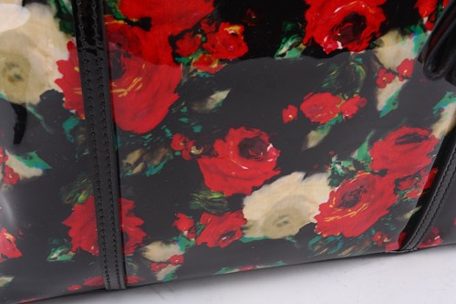 Lot 24 - Dolce & Gabbana - a large rose print shopping...