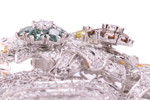 Lot 324 - A diamond 'en tremblant' brooch designed as a...