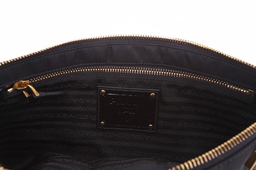 Lot 55 - Prada - a bejewelled 'Whips Pietre' clutch in...