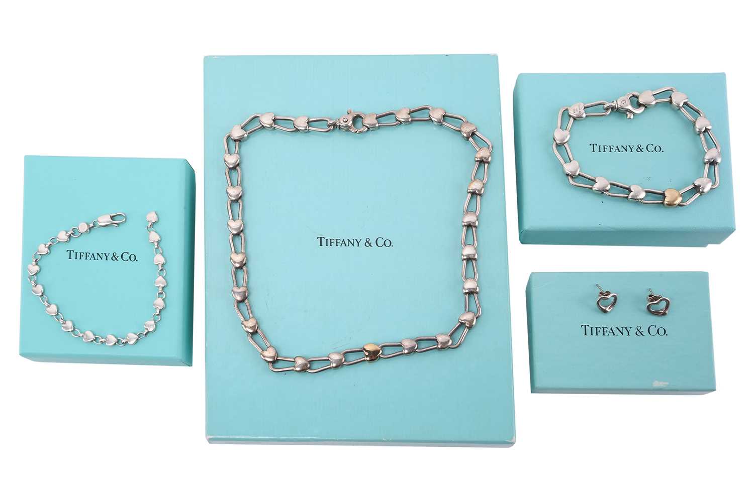 Lot 17 - Tiffany & Co. - a collection of heart-themed...
