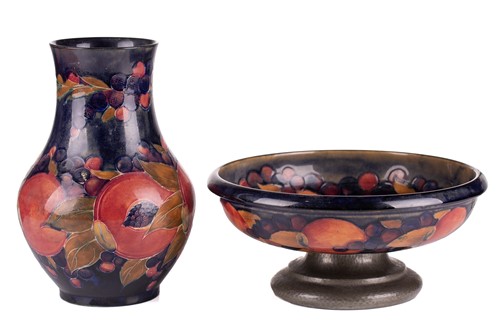 Lot 233 - A Moorcroft Pomegranate design pedestal fruit...