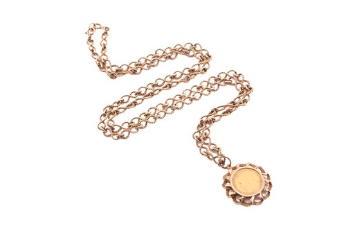 Lot 157 - A George V half sovereign pendant on chain,...