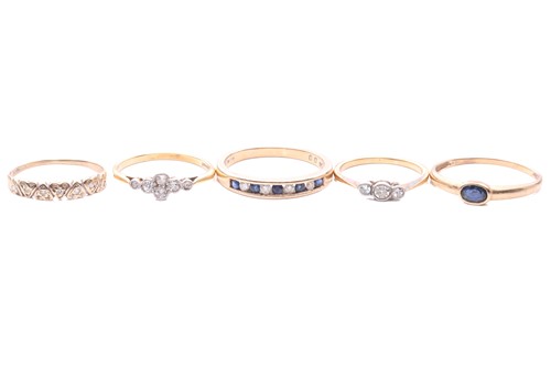Lot 17 - Five gem-set rings, to include a diamond three-...