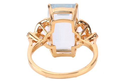 Lot 50 - An aquamarine and diamond ring, featuring a...