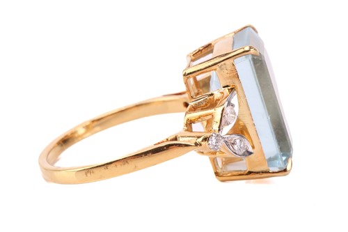 Lot 50 - An aquamarine and diamond ring, featuring a...