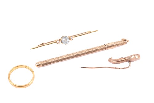 Lot 8 - A 22ct yellow gold wedding band, gem-set bar...