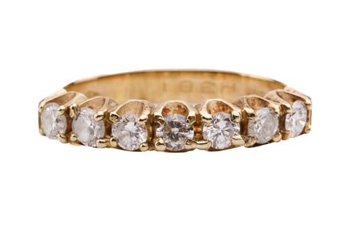 Lot 120 - A diamond half eternity ring, set with a row...