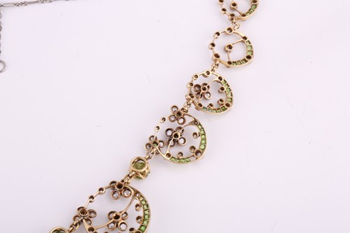 Lot 48 - An Edwardian diamond, peridot and demantoid...