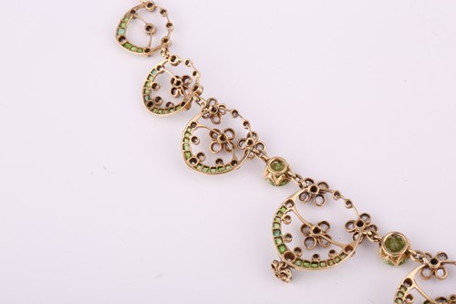 Lot 48 - An Edwardian diamond, peridot and demantoid...