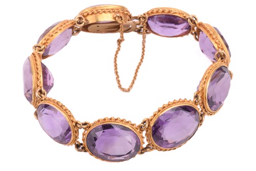 Lot 257 - A Victorian amethyst bracelet, set with a...