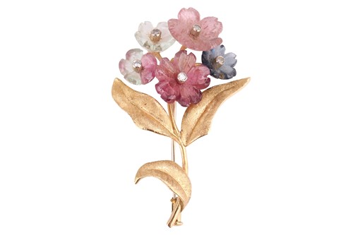 Lot 54 - An Austrian carved tourmaline spray brooch,...