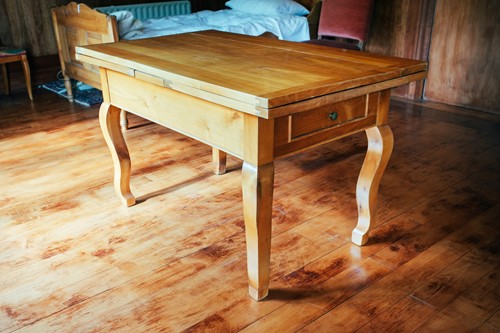 Lot 175 - A Biedermeier fruitwood extending dining table,...